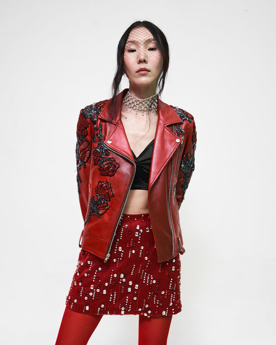 Biker jacket roja "La herencia se lleva..." con rosas