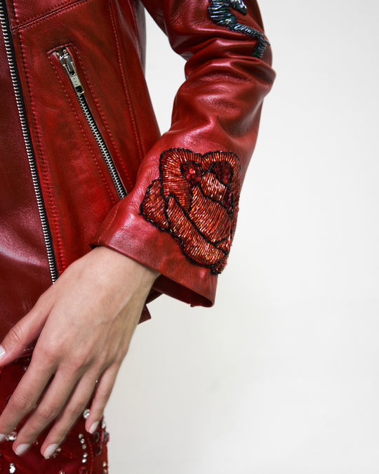 Biker jacket roja "La herencia se lleva..." con rosas