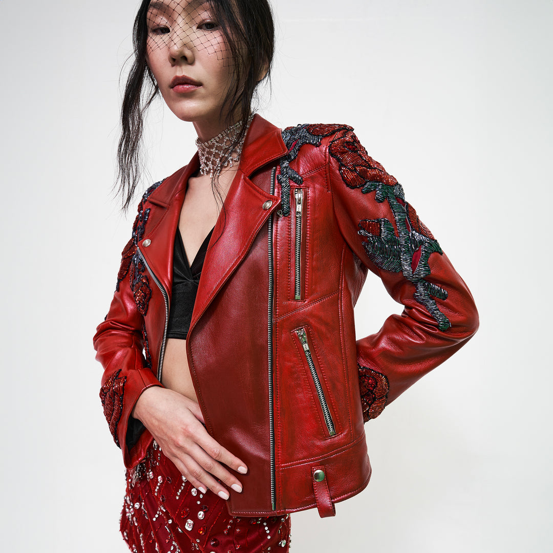 Biker jacket roja "La herencia se lleva..." con rosas