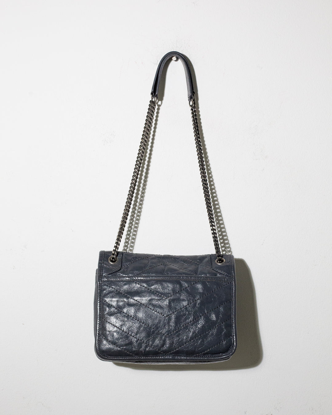 SAINT LAURENT Niky mini quilted crinkled-leather shoulder bag